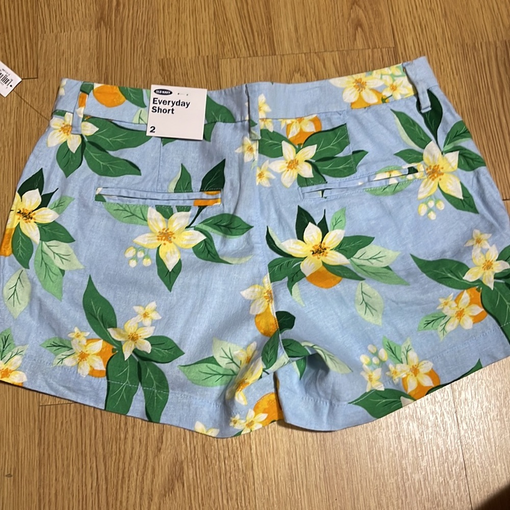 BRAND NEW WITH TAGS OLD NAVY LIGHT BLUE WITH DIFFERENT COLOR FLOWERS SHORTS! - Picture 2 of 4
